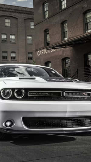 Experience Style And Power With The Dodge Charger Iphone Wallpaper