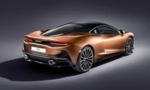 Experience The Beauty Of Motion With The Mclaren Gt Wallpaper