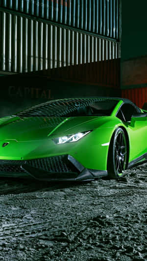 Experience The Class And Speed Of A Green Lamborghini Wallpaper