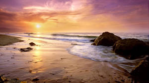 Experience The Enchanting Beauty Of Malibu, California. Wallpaper