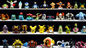 Experience The Fun Of Collecting Pokemon Figures Wallpaper