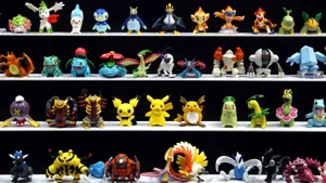 Experience The Fun Of Collecting Pokemon Figures Wallpaper