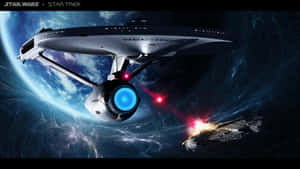 Experience The Journey Through Space Aboard The Uss Enterprise Wallpaper