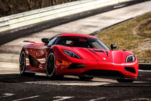 Experience The Power Of A Koenigsegg In Motion Wallpaper