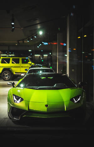 Experience The Power Of A Lamborghini On Your Iphone. Wallpaper