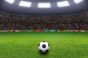 Experience The Roar Of The Crowd At A Soccer Stadium Wallpaper