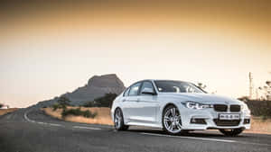 Experience The Sophistication Of The Bmw 328 Wallpaper