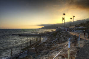 Experience The Sunrise In Malibu, California Wallpaper