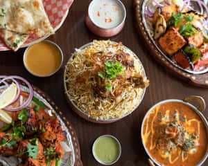 Experience The Taste Of Royal Chicken Biryani - The Crown Jewel Of Indian Cuisine Wallpaper