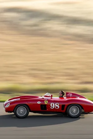 Experience The Thrill Of Driving A Classic Ferrari. Wallpaper