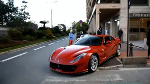 Experience The Thrill Of The Ferrari 812 Superfast In Action Wallpaper