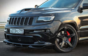 Explore The Rugged Capability Of The Jeep Trackhawk Wallpaper