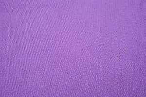 Explore The World Of Beautiful Silk & Satin Fabrics In This Stunning Violet Hue. Wallpaper