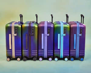 “explore The World With The Stylish Purple Travel Bag” Wallpaper
