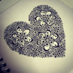 Expressive Heart Doodle On A Crumpled Page Wallpaper