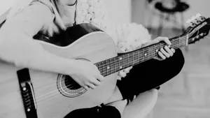 Expressive Monochrome Melody - A Black And White Guitar Wallpaper