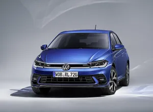 Exquisite Design Of Volkswagen Polo In Action Wallpaper