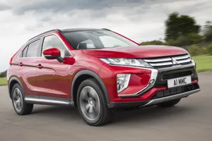 Exquisite Mitsubishi Eclipse In Vibrant Sunset Wallpaper