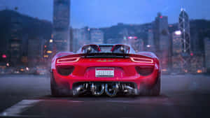 Exquisite Porsche 918 Spyder On An Open Road. Wallpaper