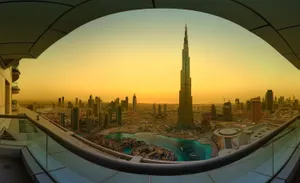 Exquisite Sunrise Reflected In Burj Khalifa Wallpaper