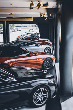 Extravagant Cars Parked Phone Wallpaper