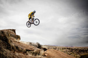 Extreme Cycling Rock Jump Wallpaper