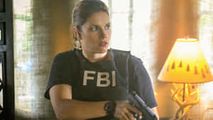 F B I Agentin Action Wallpaper