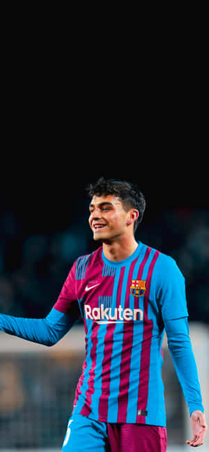 F C Barcelona Midfielder Smiling During Match Wallpaper