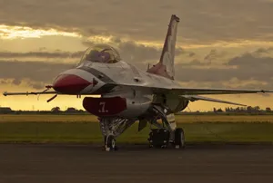 F16 Fighter Jetat Dusk Wallpaper