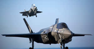 F35 Jet Hoveringand Landing Wallpaper