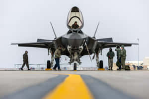 F35 Jet Maintenance Crew Preparation Wallpaper