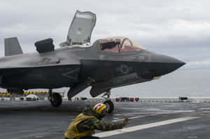 F35 Jet On Aircraft Carrier Deck Wallpaper