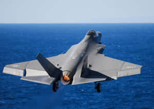 F35 Jet Over Sea Wallpaper