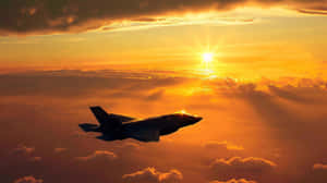 F35 Jet Sunset Flight Wallpaper