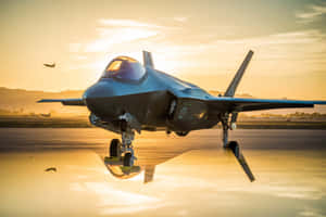 F35 Jet Sunset Reflection Wallpaper