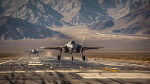 F35 Jets Runway Mountain Backdrop Wallpaper