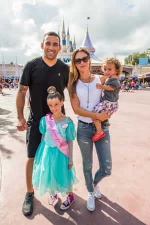 Fabricio Werdum And Family In Disneyland Wallpaper