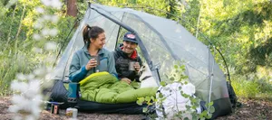 Fall Camping Adventure In A Serene Forest Wallpaper