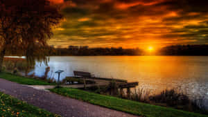 Fall Sunset: A Warm Golden Evening By The Lake Wallpaper