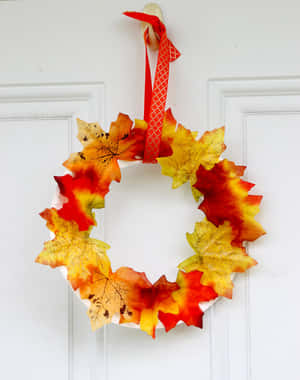 Fall Wreath - A Vibrant Welcome To The Season Wallpaper