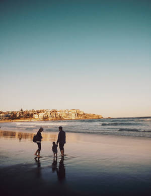 Family At The Dark Beach Wallpaper