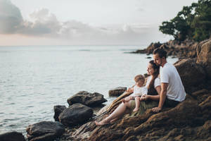 Family At The Seashore Wallpaper