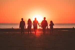 Family Beach Sunset Silhouette Wallpaper