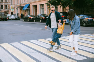 Family In Busy Street Wallpaper