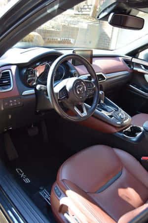 Family On A Road Trip In A Stylish Family Car Wallpaper