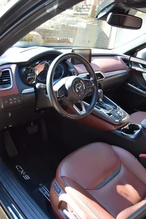 Family On A Road Trip In A Stylish Family Car Wallpaper