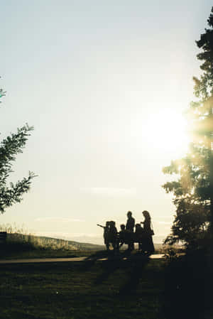 Family Sunset Silhouette Park Wallpaper