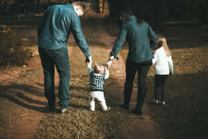 Family Walk Togetherness Outdoors.jpg Wallpaper