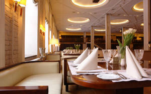 Fancy Restaurant With Brown And White Theme Wallpaper