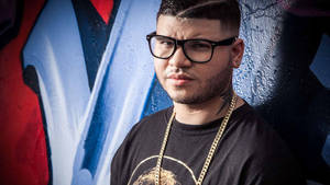 Farruko Leaning On The Wall Wallpaper